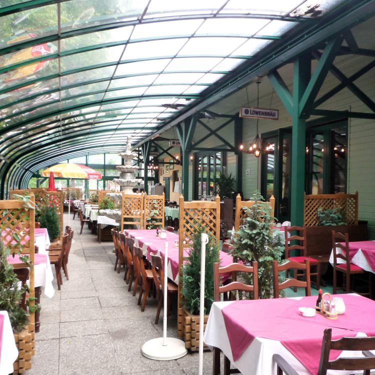 Véranda mobile I Salle de restaurant découvrable grâce à un abri rétractable
										